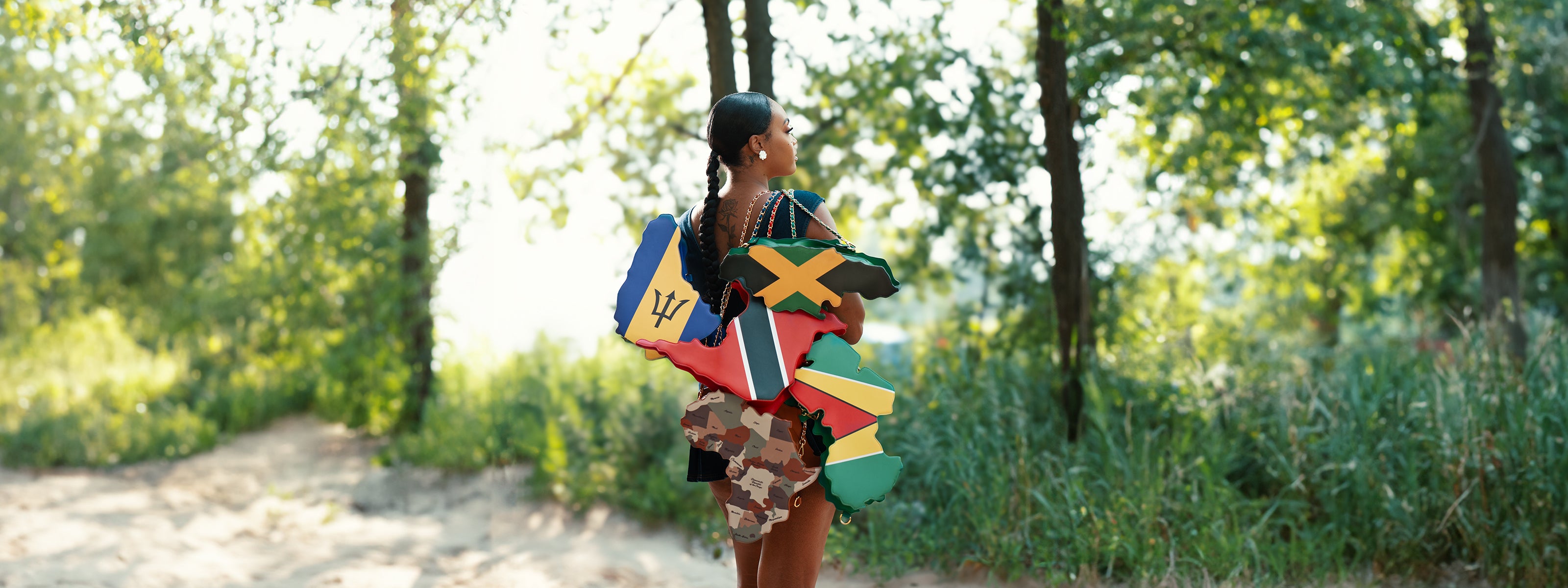 flag bag, cultural fashion, patriotic accessories, statement handbag, travel tote, unique designer bag, luxury flag bag, Caribbean pride, African heritage bag, national flag purse, ethnic fashion, vibrant handbags, bold fashion statement, handcrafted bags, cultural identity fashion, exclusive designer bags