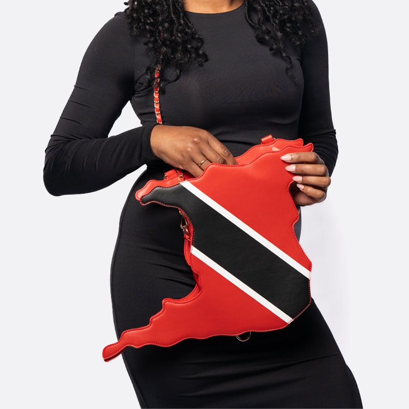 flag bag, cultural fashion, patriotic accessories, statement handbag, travel tote, unique designer bag, luxury flag bag, Caribbean pride, African heritage bag, national flag purse, ethnic fashion, vibrant handbags, bold fashion statement, handcrafted bags, cultural identity fashion, exclusive designer bags, Trinidad handbag, Trini pride bag, Trinidad and Tobago purse, red black and white bag, Trinbago fashion, Caribbean flag bag, soca fashion