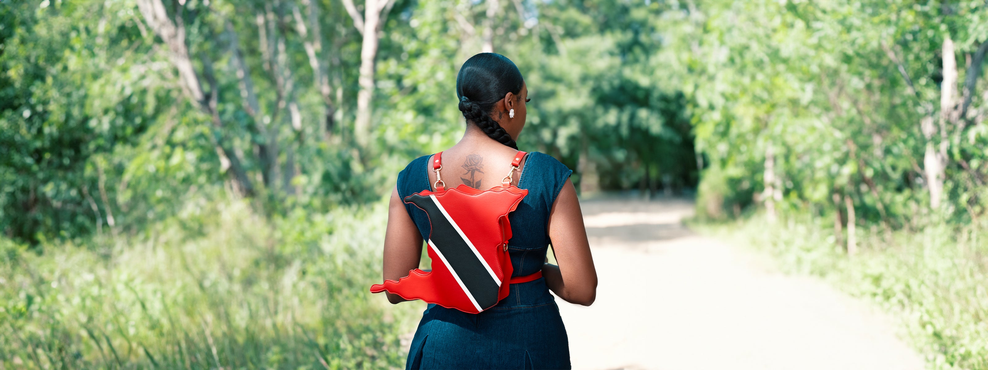 Trinidad handbag, Trini pride bag, Trinidad and Tobago purse, red black and white bag, Trinbago fashion, Caribbean flag bag, soca fashion, flag bag, cultural fashion, patriotic accessories, statement handbag, travel tote, unique designer bag, luxury flag bag, Caribbean pride, African heritage bag, national flag purse, ethnic fashion, vibrant handbags, bold fashion statement, handcrafted bags, cultural identity fashion, exclusive designer bags