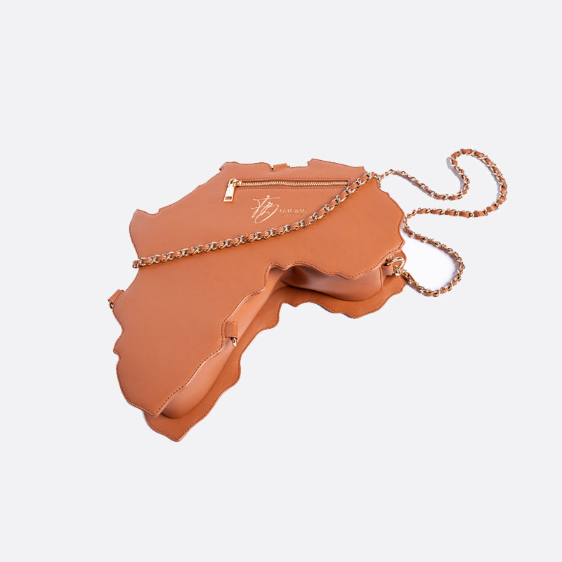 flag bag, cultural fashion, patriotic accessories, statement handbag, travel tote, unique designer bag, luxury flag bag, Caribbean pride, African heritage bag, national flag purse, ethnic fashion, vibrant handbags, bold fashion statement, handcrafted bags, cultural identity fashion, exclusive designer bags, Africa heritage bag, Pan-African handbag, African pride purse, red black green yellow bag, African fashion, Afrocentric accessories, motherland tote