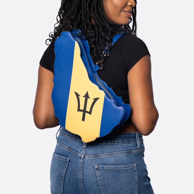 flag bag, cultural fashion, patriotic accessories, statement handbag, travel tote, unique designer bag, luxury flag bag, Caribbean pride, African heritage bag, national flag purse, ethnic fashion, vibrant handbags, bold fashion statement, handcrafted bags, cultural identity fashion, exclusive designer bags, Barbados handbag, Bajan flag purse, blue yellow and black bag, Barbados heritage bag, Trident fashion, Crop Over festival bag, Bridgetown accessories