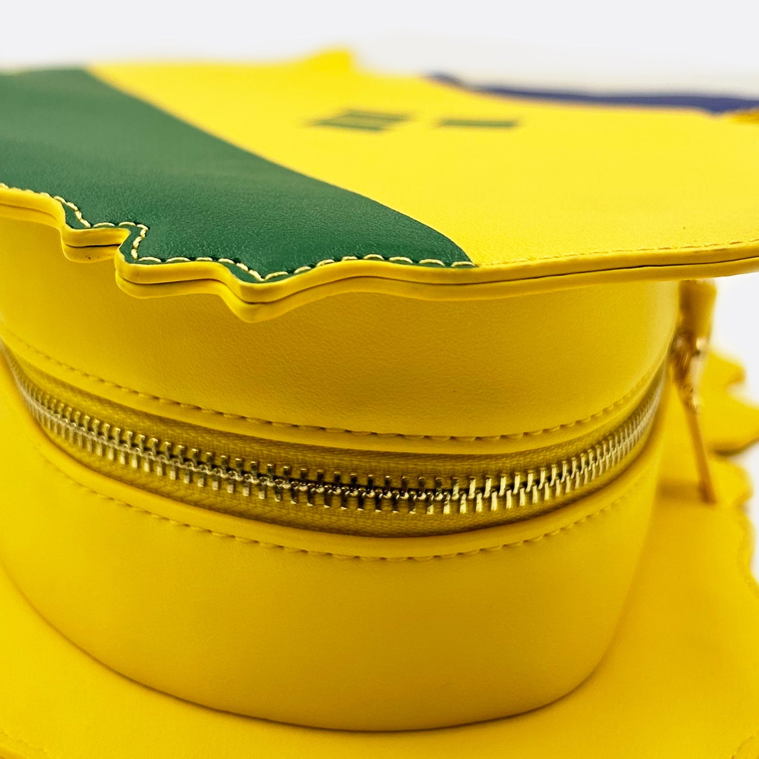 flag bag, cultural fashion, patriotic accessories, statement handbag, travel tote, unique designer bag, luxury flag bag, Caribbean pride, African heritage bag, national flag purse, ethnic fashion, vibrant handbags, bold fashion statement, handcrafted bags, cultural identity fashion, exclusive designer bags, St. Vincent handbag, Vincy pride bag, St. Vincent and the Grenadines purse, green yellow and blue bag, Caribbean heritage fashion, Kingstown tote